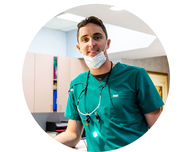 Headshot of doctor Gavin Ewing within the dental office
