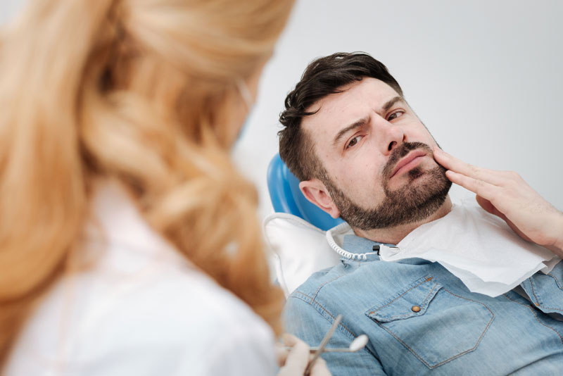 dental patient with tooth pain